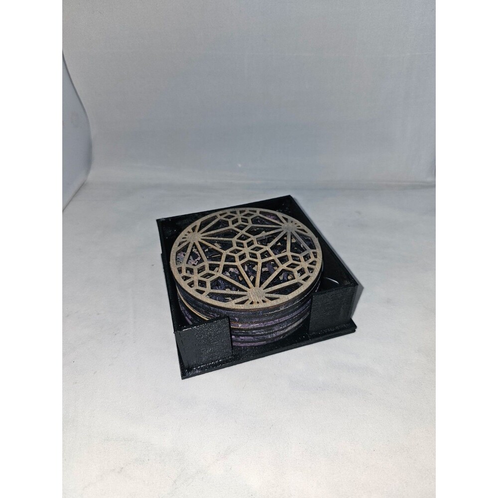 Set of 12 coasters and holder.